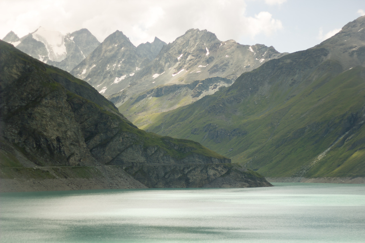 Over the past couple years, I’ve traveled to some amazing places, and taken pretty neat photos. So far, they’ve been sitting on my computer, serving only my occasional enjoyment—hardly an appropriate fate.
Instead, I’ve decided to start slowing sharing these on here. Over the next few months, I’ll try to post the brief backlog of good photos taken in and around 2013.
This particular photo was taken in the summer of 2012, on a trip to Switzerland. It’s the Lac de Moiry, a glacier-fueled lake behind a dam.